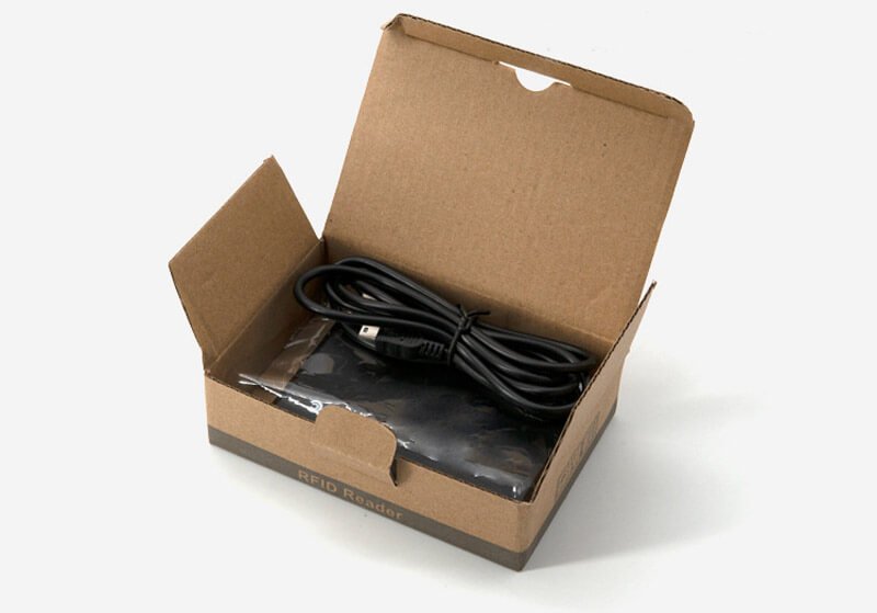 Fotografía de Lector de control de acceso de 13.56MHz para tarjetas IC que muestra este aspecto: escaneo sin contacto; en la categoría de Lectores RFID HF de 13.56MHz.