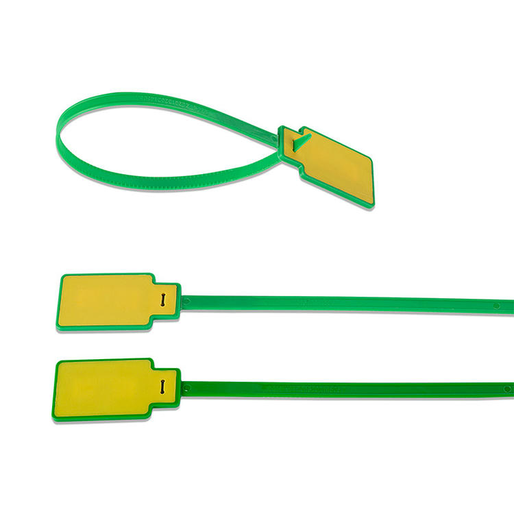 Fotografía de una etiqueta RFID tipo brida modelo Z33230-1 cerrada en lazo y dos rectas que destaca la superficie amarilla de la etiqueta y el diseño del cabezal de cierre.