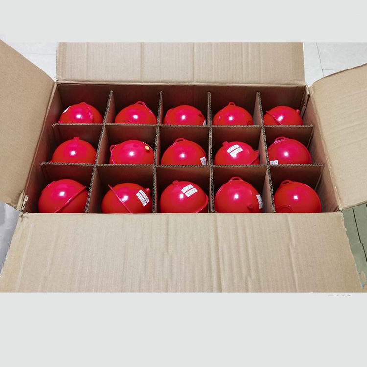 Una caja de cartón contiene varios marcadores esféricos ED1500 dispuestos en compartimentos para presentar su embalaje y almacenamiento y envío organizados.