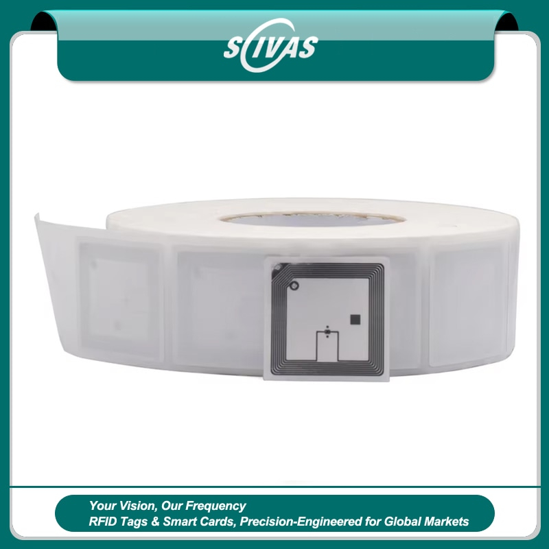 Fotografía de Adhesivo RFID HF para control de inventario minorista que muestra este aspecto: impresión personalizada de tarjetas; en la categoría de Etiquetas RFID HF.